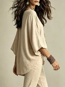 Casual autumn women's top featuring a V-neck, 3/4 sleeves, and a loose cotton linen fit.