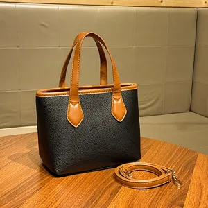 Stylish women's black and brown lychee pattern tote bucket bag with shoulder strap for daily use.
