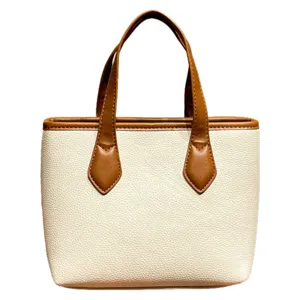 Classic white textured PU leather handbag with brown handles, stylish daily tote bag for women.