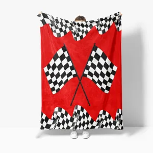 Close-up detail of the racing checkered flannel blanket, showcasing cozy red fabric.