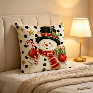 Christmas snowman print decorative pillow cover detail showing cozy bedroom setting design.