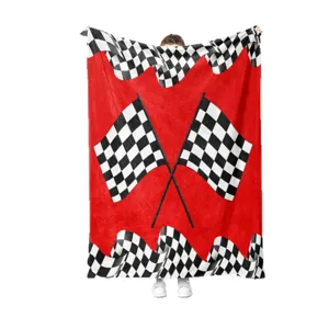Racing print flannel blanket with checkered flag design, soft comfortable throw for all seasons.
