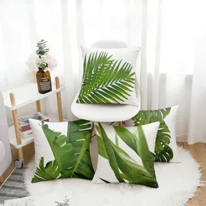 Waterproof tropical leaf throw pillow covers set of 4, outdoor cushion cases for home decor.