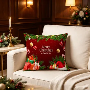 Christmas throw pillow detail view, festive red cushion with gift and tree print for sofa.