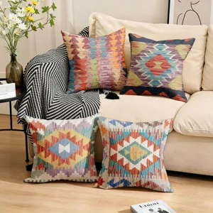 Bohemian style decorative pillow cover with ethnic geometric print for living room sofa decor.