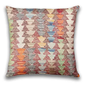Bohemian geometric throw pillow cover featuring vibrant tribal pattern for modern home decor.