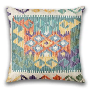 Bohemian style throw pillow cover with vibrant Kilim geometric ethnic print design.