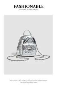 Silver quilted mini backpack for women, stylish metallic chain straps and trendy design.