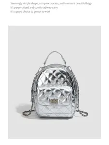 Silver quilted chain mini backpack detail showcasing metallic texture and classic flap design.