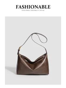 Brown leather shoulder bag detail, large capacity hobo commuting tote for women autumn winter.
