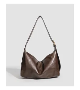 Women's brown slouchy shoulder bag, large capacity PU leather tote for daily commute and styling.