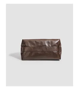 Brown large capacity leather shoulder tote bag, versatile vintage commuting bag for autumn.