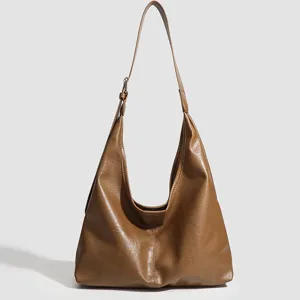 Retro soft leather large capacity tote shoulder bag for women daily casual commuting style.