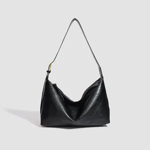 Black large shoulder bag for women, soft slouchy hobo tote bag for daily autumn commuter fashion.