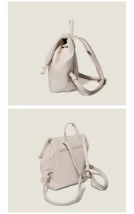 Vista dettagliata del mini zaino geometrico beige da donna con angoli laterali e posteriori.