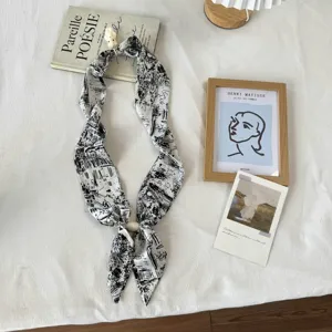Black and white printed skinny scarf twilly with cute pendant for women fashion accessory.