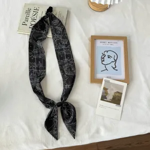 Black silk twilly scarf with elegant retro print, chic neck accessory for women daily.