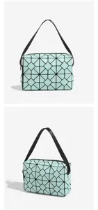 Chic geometric rhombus handbag with black handle, stylish minimalist commuter square bag.
