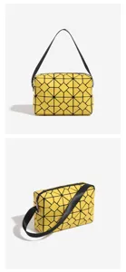 Stylish yellow geometric lattice handbag, versatile casual crossbody bag for women.