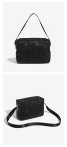 Black geometric lattice detail of this stylish crossbody shoulder bag with zipper closure.