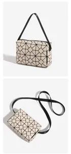 Detailed view of beige geometric lattice crossbody bag showing unique pattern and black strap.