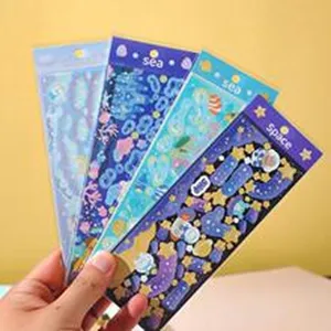Cute holographic journaling stickers set, laser space and sea decorative craft supplies.
