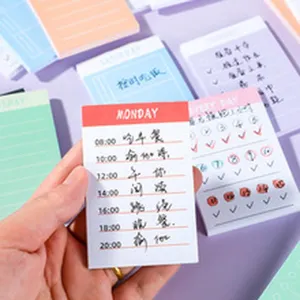 Detail view of colorful daily plan sticky notes, ideal for study and office organization.