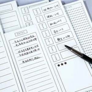 Minimalist memo pad set with daily planner layout sticky notes and cute todo lists for office.