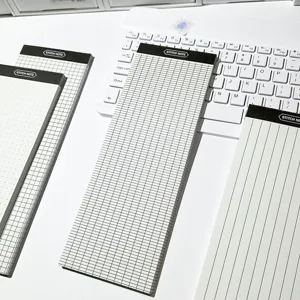 Detailed view of long creative sticky notepads with grid, dot and lined paper for students.