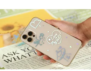 Close-up detail of transparent laser phone stickers with cute cartoon designs and text art.