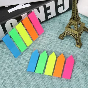 Close-up detail of colorful PET fluorescent index sticky notes and page marker tabs.