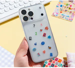 Clear close-up of a frosted phone case with colorful number prints on a bright desk.