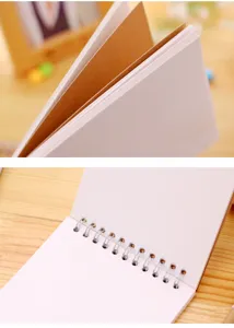 Classic kraft paper cover spiral notebook with blank white inner pages for daily writing sketching.