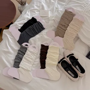 Korean style slouchy leg warmers with foot stirrup design, cozy knit material for autumn.
