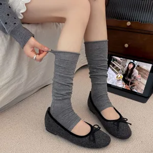 Korean style ballet core stirrup leg warmers for women, cozy grey slouchy cotton socks.