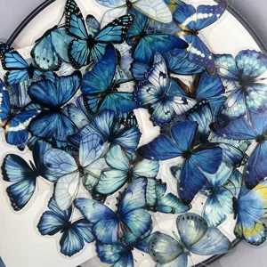 Cute blue butterfly PET transparent waterproof stickers for scrapbooking journals and crafts.