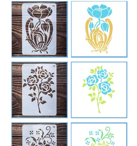 Close-up of hollow floral painting stencils showing tulip and rose pattern details clearly.