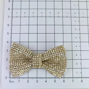 Detailed view of the sparkling rhinestone bow accessory, perfect for shoes and crafts.