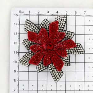 Rhinestone flower accessory detail showing size on grid board, perfect for DIY phone cases and shoes.
