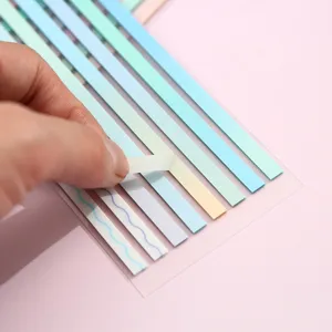 Close-up detail of Morandi color sticky notes, translucent index tabs for journaling.