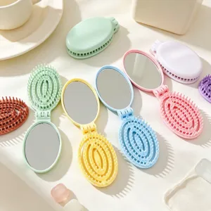 Spazzola per capelli pieghevole portatile con specchio, mini set pettine trucco pastello.