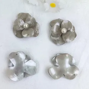 Resin marbled flower hair clips diy accessories with faux pearl and rhinestone details.
