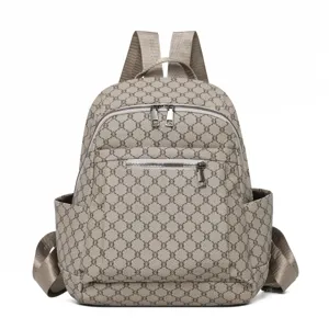 Detailed view of the stylish vintage monogram print women's fashion casual backpack.