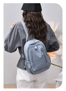 Grey blue nylon backpack for women, casual daily commuter school bag with multi-pockets.