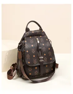 Vintage brown leather backpack with cute rabbit monogram pattern, spacious casual daypack.