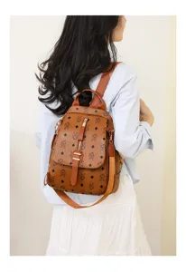 Vintage brown leather women backpack with unique pattern, spacious daily commute bag.