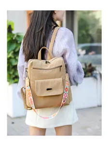 Versatile beige women backpack with colorful embroidered wide strap and anti-theft design.