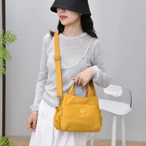 Casual nylon crossbody shoulder bag for women, large capacity stylish commute tote handbag.