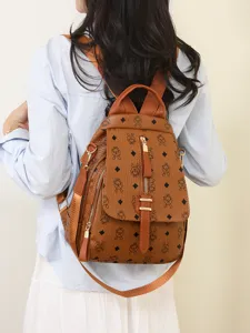Vintage brown leather backpack for women, stylish casual commuting large capacity school bookbag.
