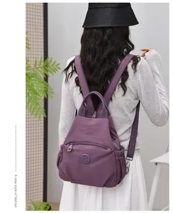 Multifunctional lightweight nylon backpack for women, casual travel daypack and anti-splash bag.